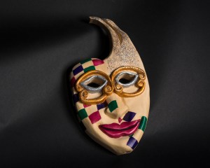 Jesters mask, red, green, and purple squares, gold and silver eyes and glitter