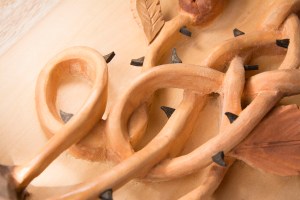 Close-up of rose carving, thorns and undercutting