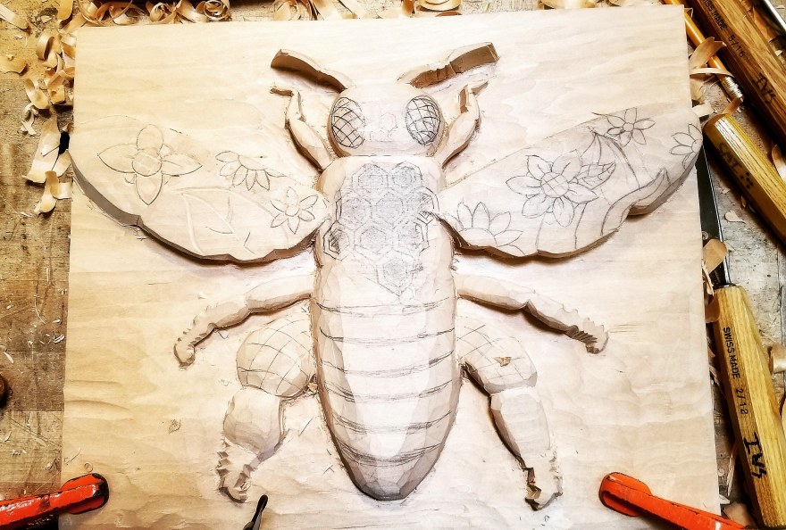 Unfinished bee woodcarving